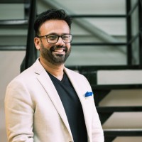 Professional headshot of Azam Mirza